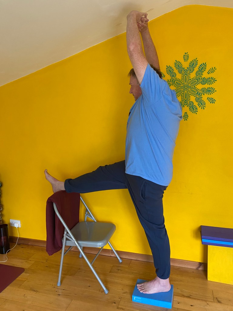 Yoga student practicing mindfulness asana in my private studio in Welwyn Garden City, Hertfordshire 